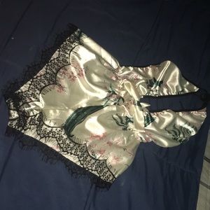 Never been warn. Romper/lingerie/silk. Size- M
